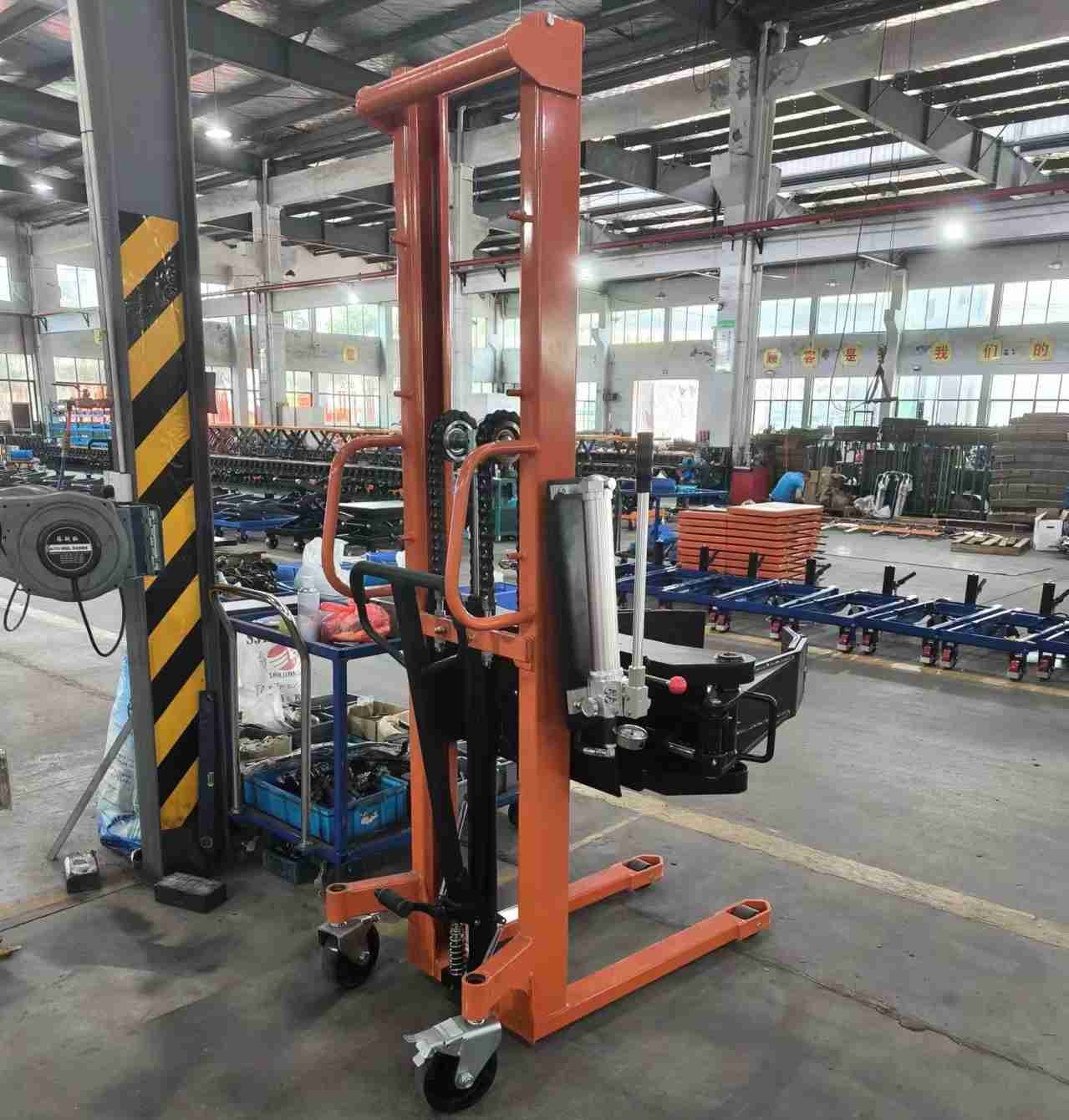 CE Certificated 250kg 300kg 500kg 1.6meters Manual Roll Stacker With Clamp And Rotator